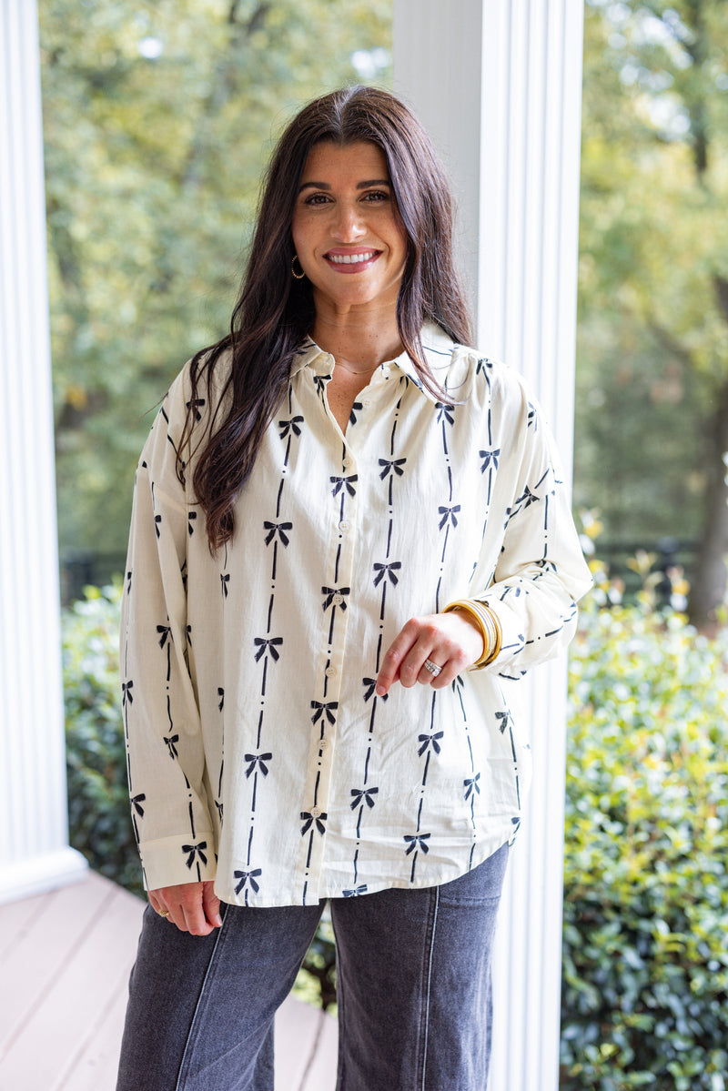 ivory black bow printed button down top