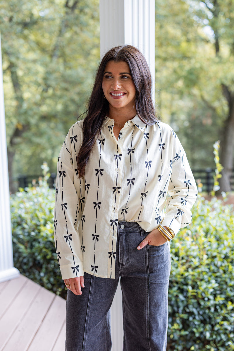 ivory black bow printed button down top