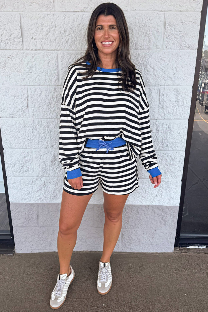 black and white striped with blue trim pullover and wide leg shorts matching knit set