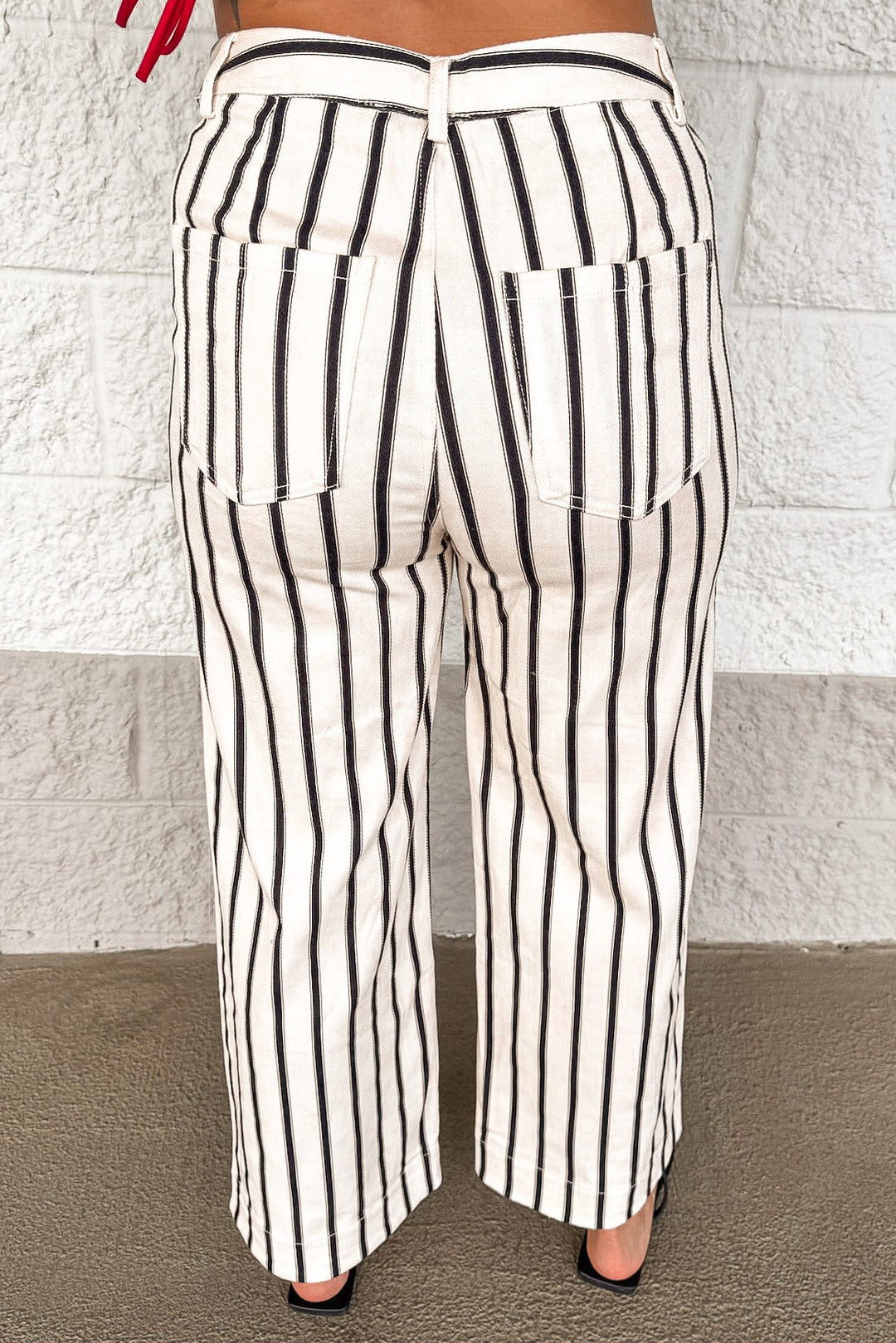 cream and black vertical striped wide leg cropped denim pants with back pockets