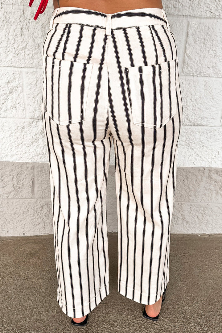 cream and black vertical striped wide leg cropped denim pants with back pockets