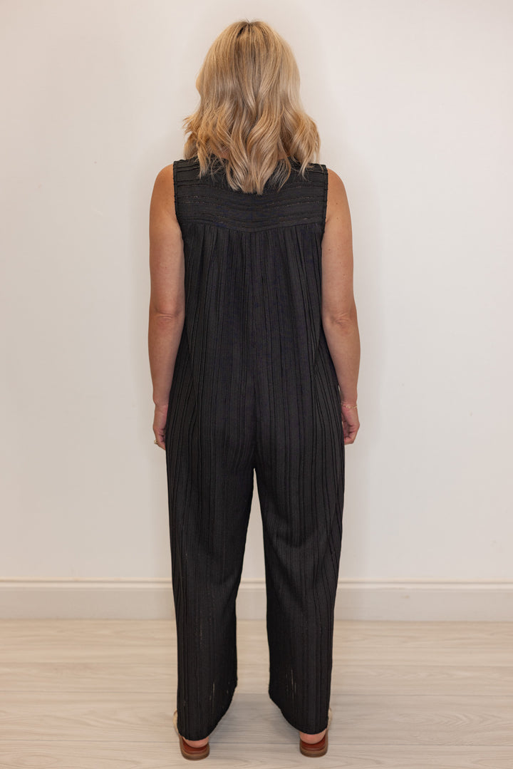 Women's black textured summer romper by Jodifl showing full back view