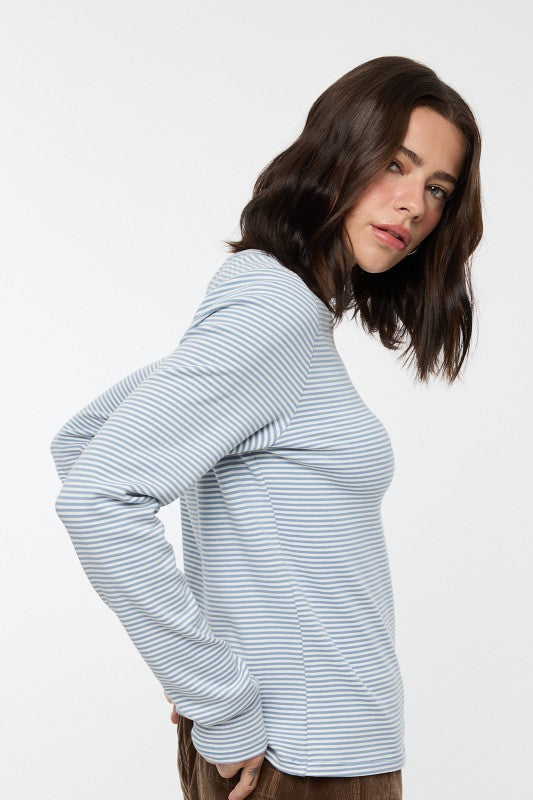 Women's blue and white striped knit long sleeve top by Wishlist showing side view