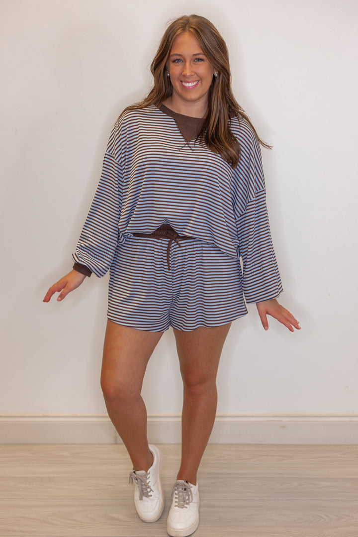 Women's light blue and brown striped knit shorts with contrasting terry knit trim by BucketList showing full front view