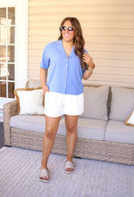 classic style blue button down top