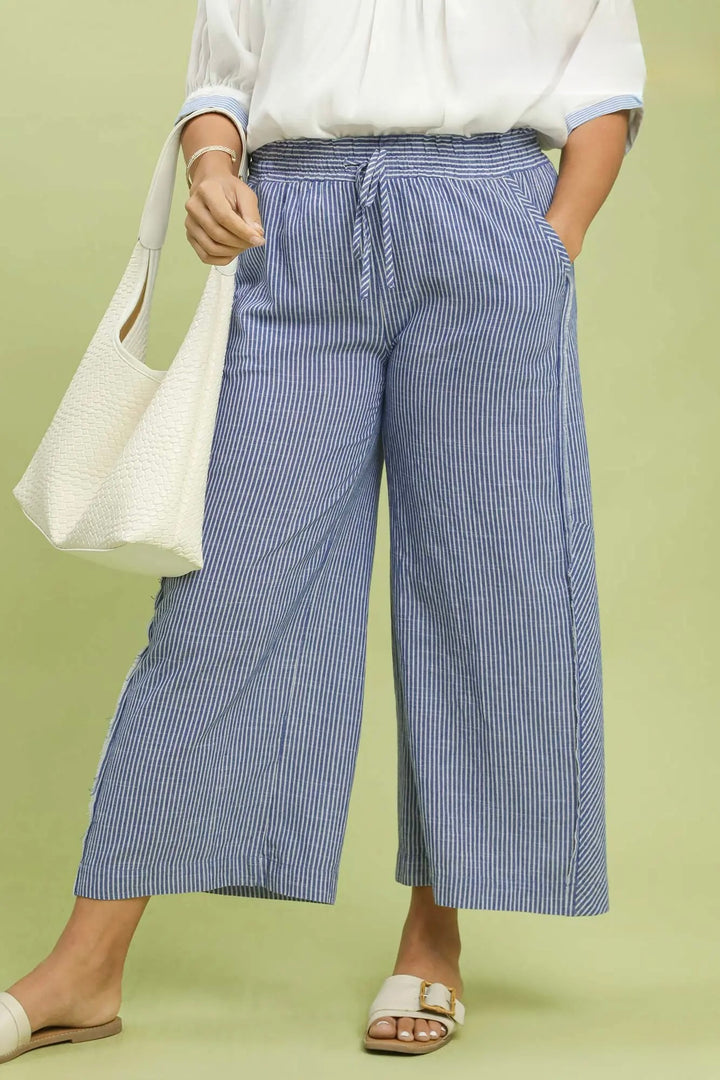 Umgee blue and cream striped wide leg linen pants with frayed seam details in plus size