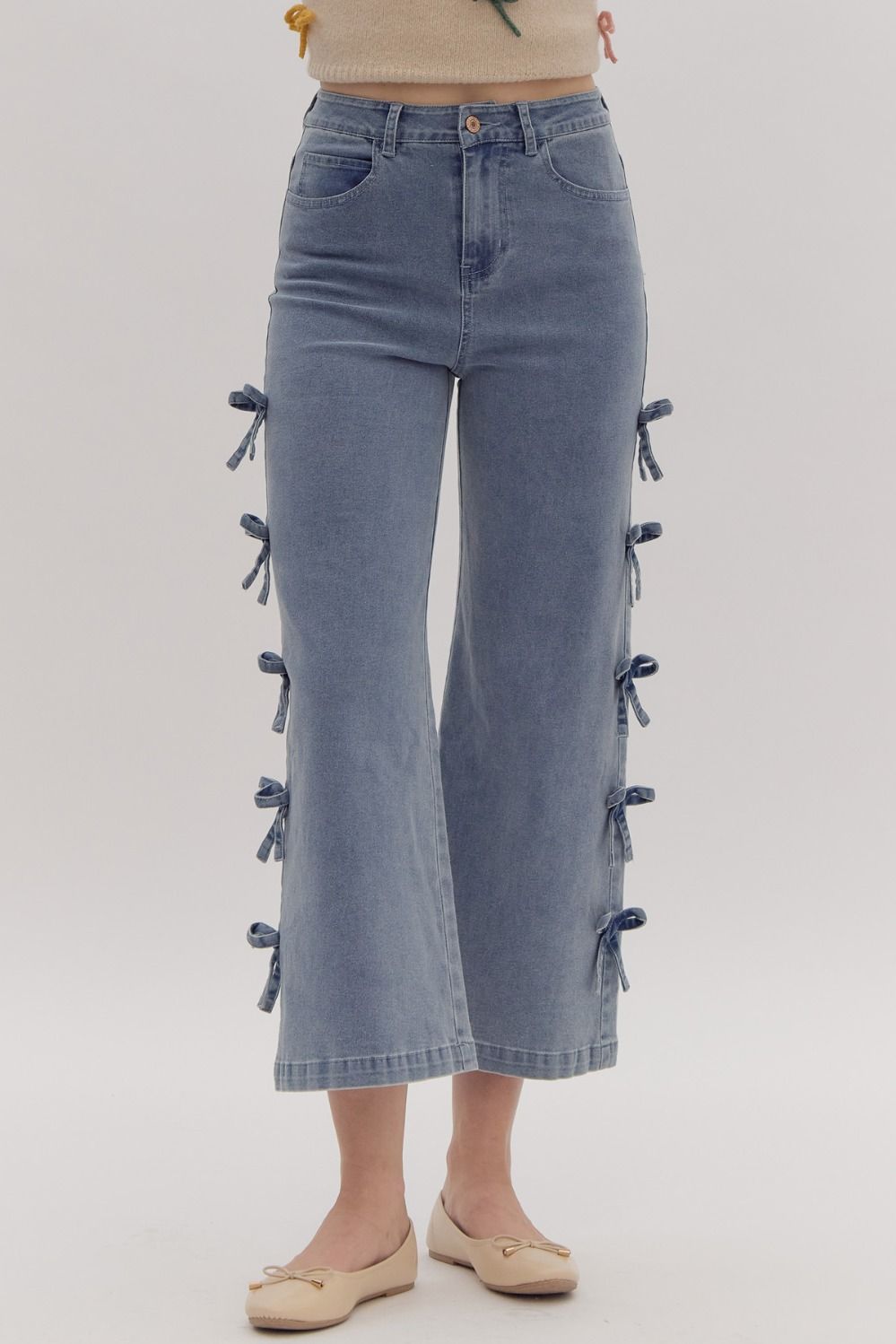 Entro Blue cropped denim pants with bow tie trim down the sides