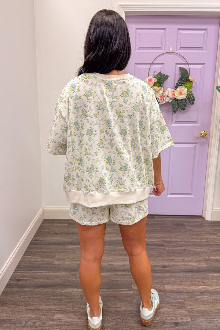 back view of Women's blue and light green floral shorts set