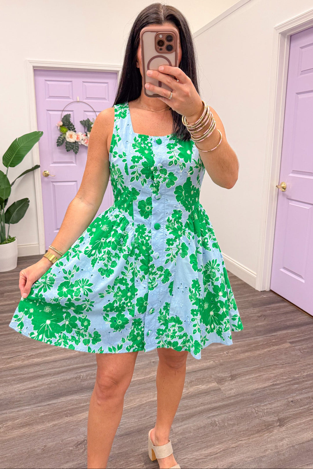 light blue and green floral print button down sleeveless flowy dress