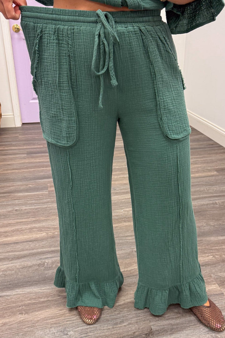solid bluish green ruffled hem wide leg elastic waist cotton gauze pants with reverse seam details