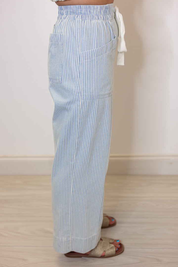 Women's light blue and cream striped wide leg cropped pants by &merci showing side view