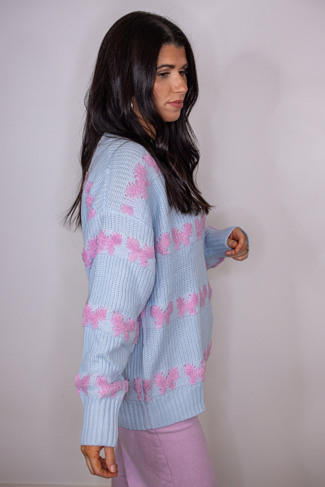blue pink stitched bow detail sweater