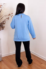 blue scuba knit mock neck pullover top