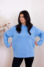 blue scuba knit mock neck pullover top