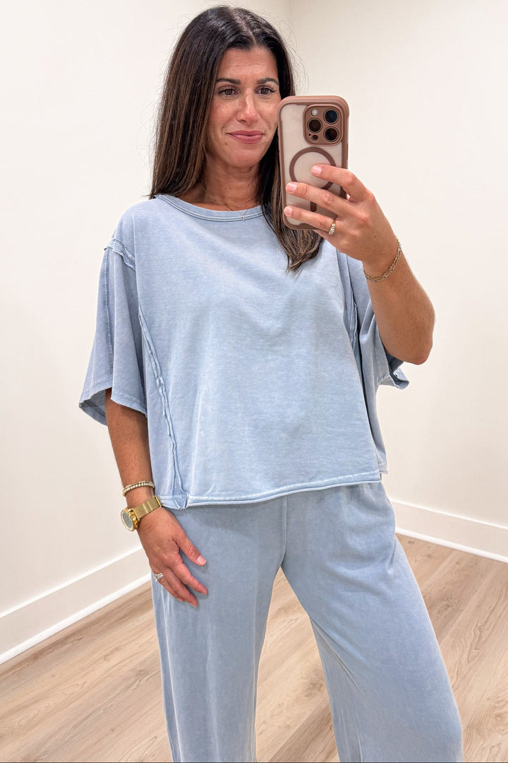 solid light blue short sleeve crew neckline relaxed boxy knit top