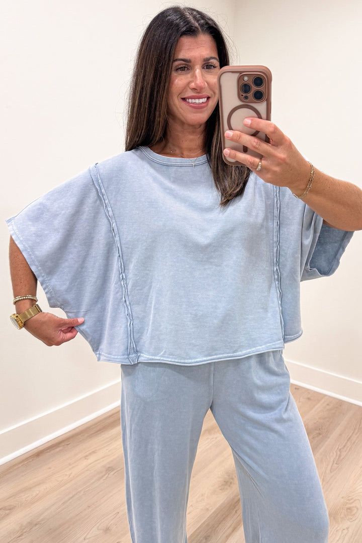 solid light blue short sleeve crew neckline relaxed boxy silhouette knit top
