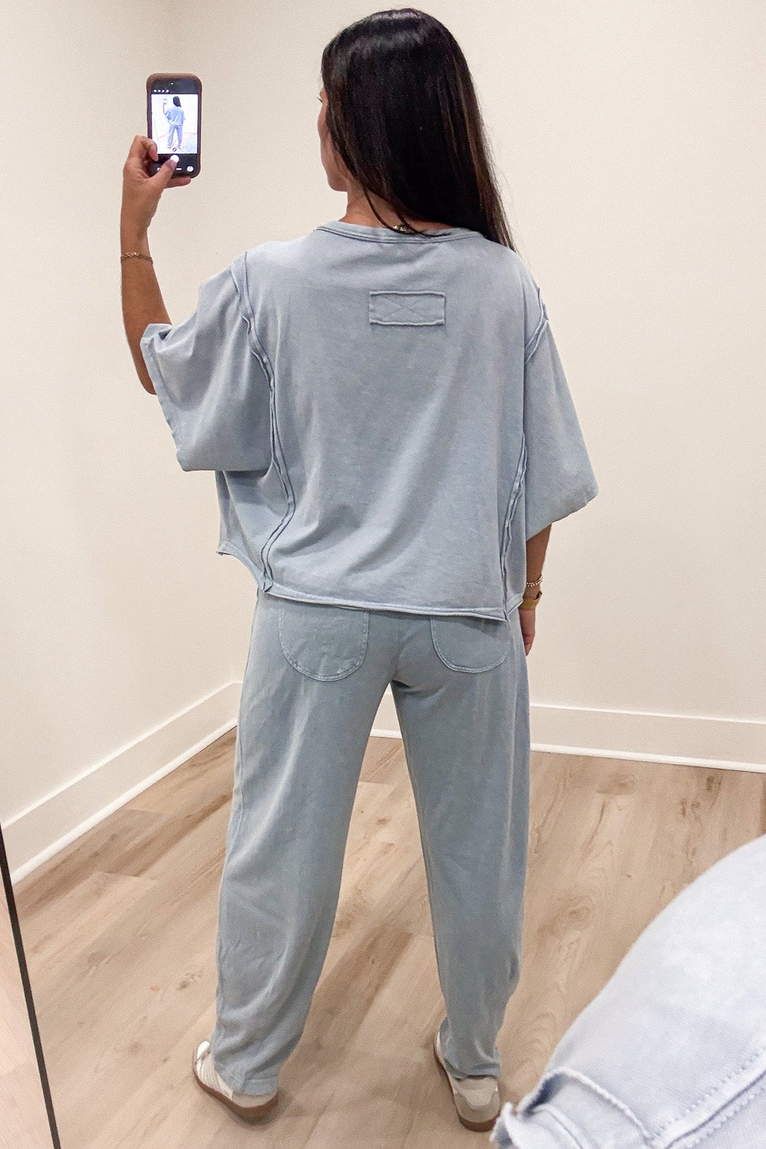 solid light blue short sleeve crew neckline relaxed boxy knit top with reverse seam details