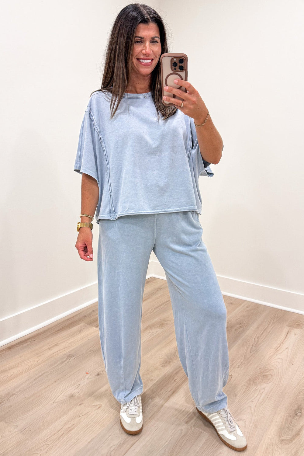 solid light blue short sleeve crew neckline relaxed boxy semi-cropped knit top