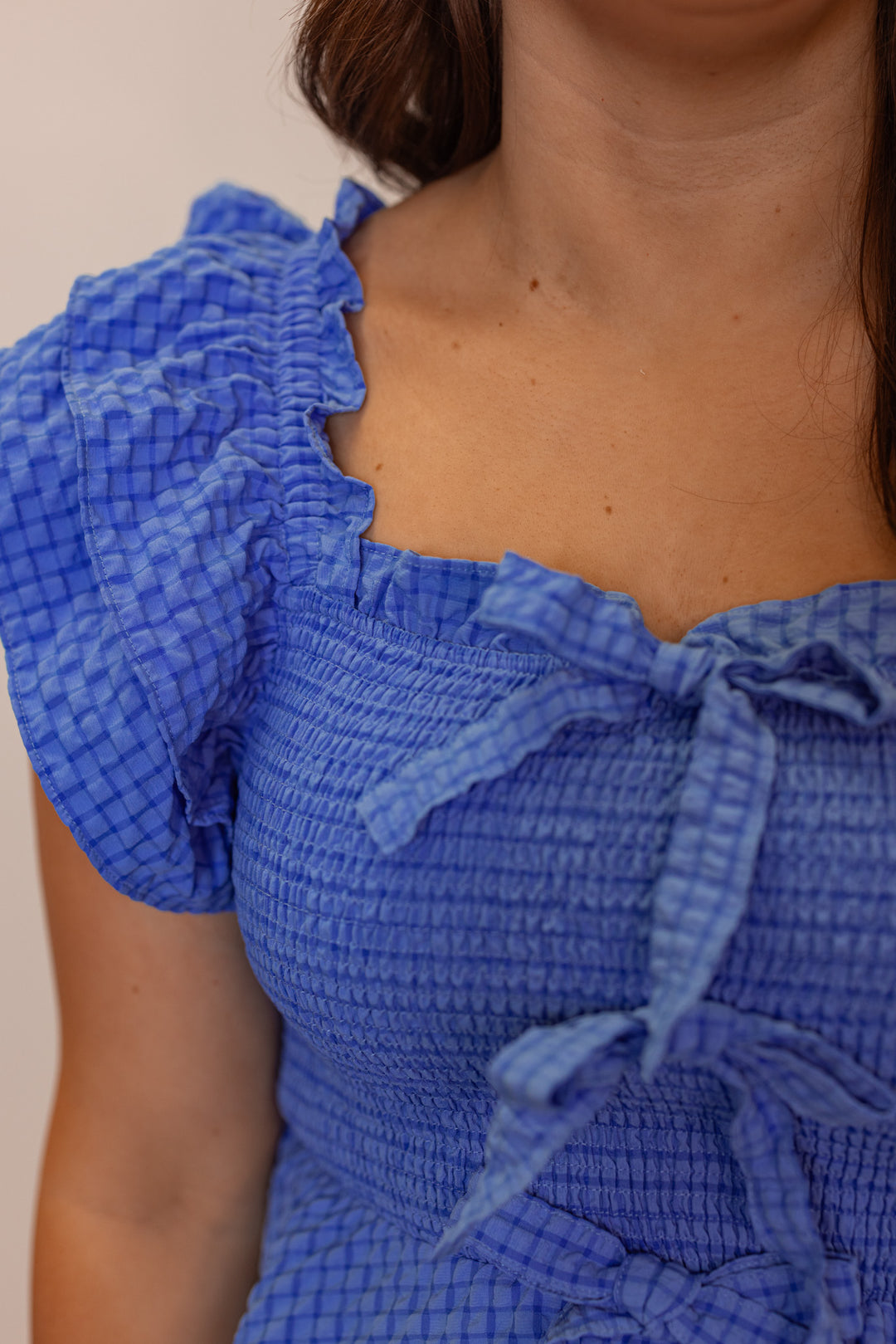 blue smocked ruffle peplum top