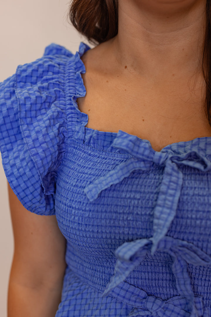blue smocked ruffle peplum top