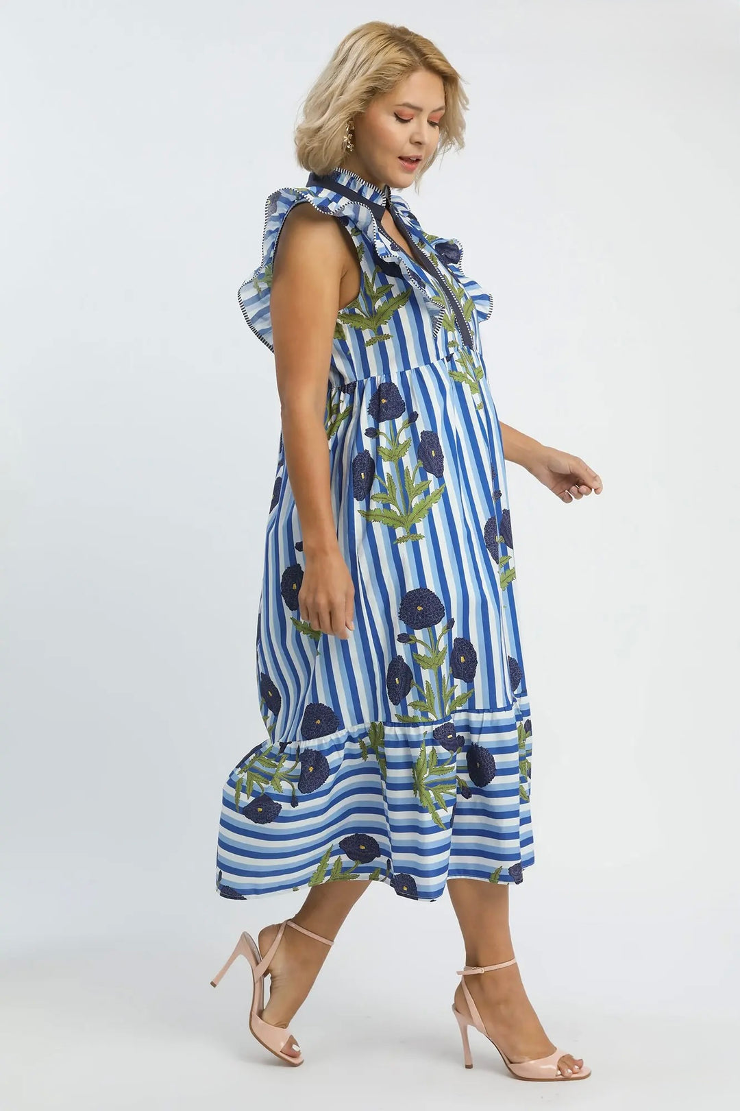Women's Umgee blue and white striped midi dress with navy and green florals in plus size showing a side view