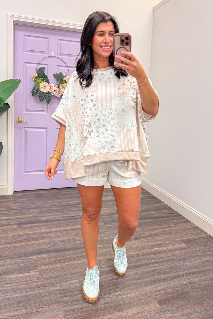 Women's Taupe and blue floral print lounge shorts set.