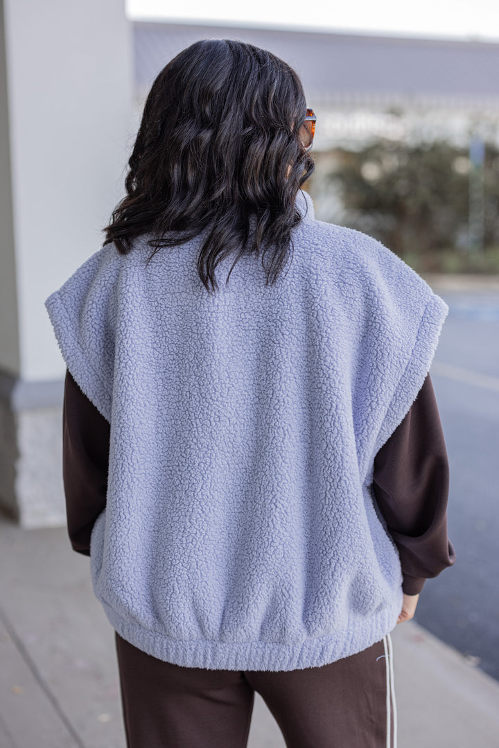 Women's light blue sherpa vest by Rae Mode showing back view