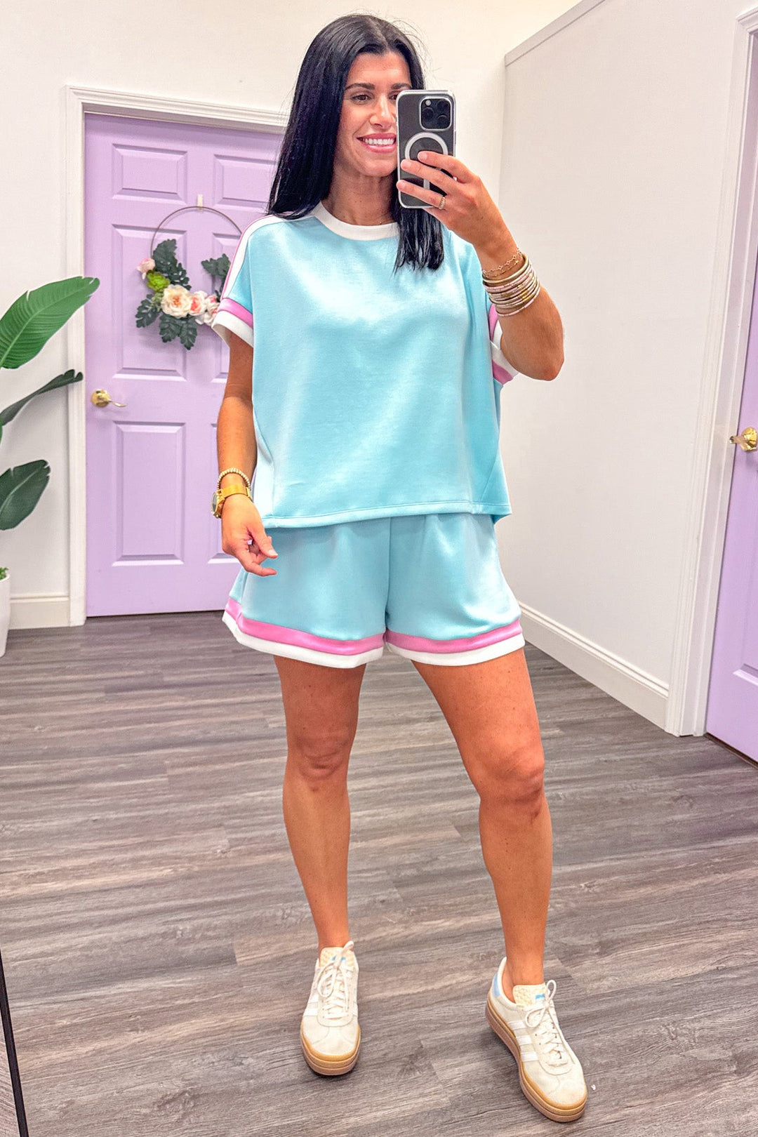 pink and white trimmed short sleeve drop shoulder scuba knit blue top