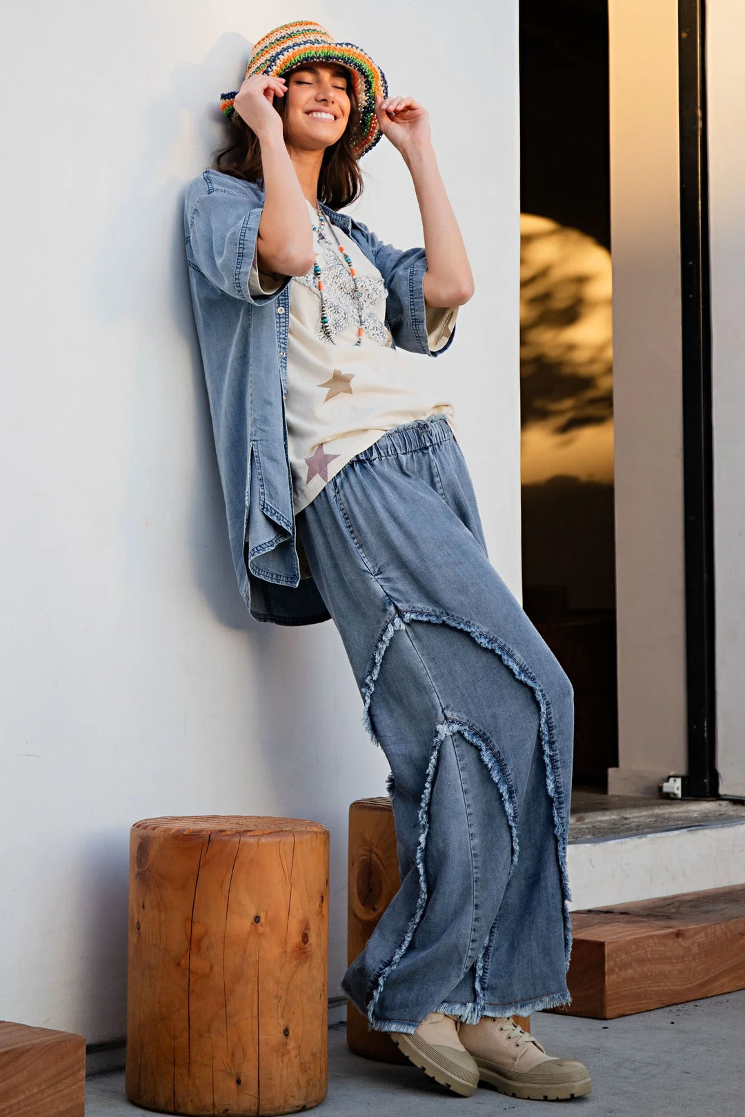 Easel Palazzo style wide leg washed blue denim pants with frayed fringe details