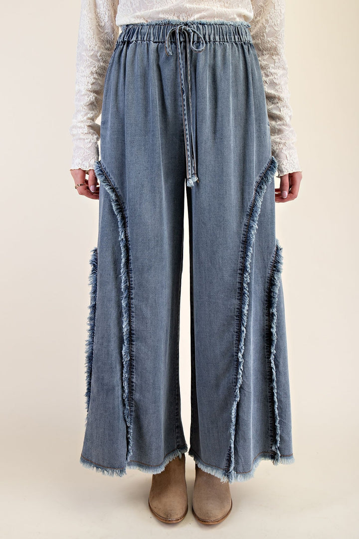Easel Palazzo style wide leg washed blue denim pants with frayed fringe details