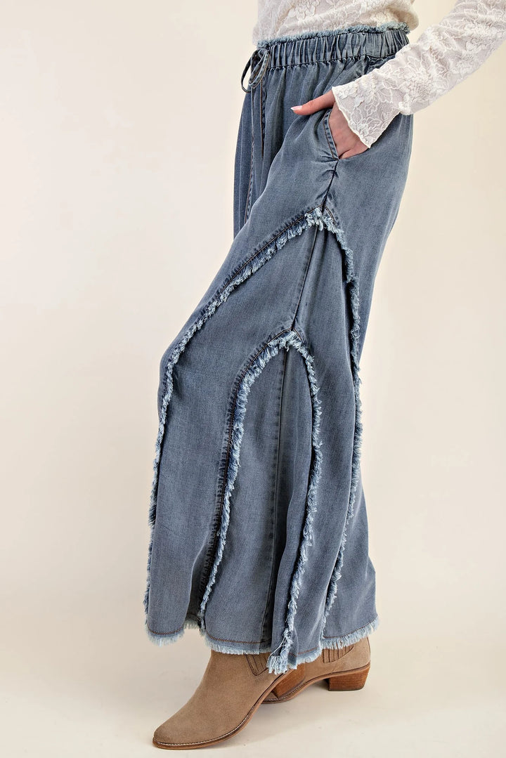 Easel Palazzo style wide leg washed blue denim pants with frayed fringe details