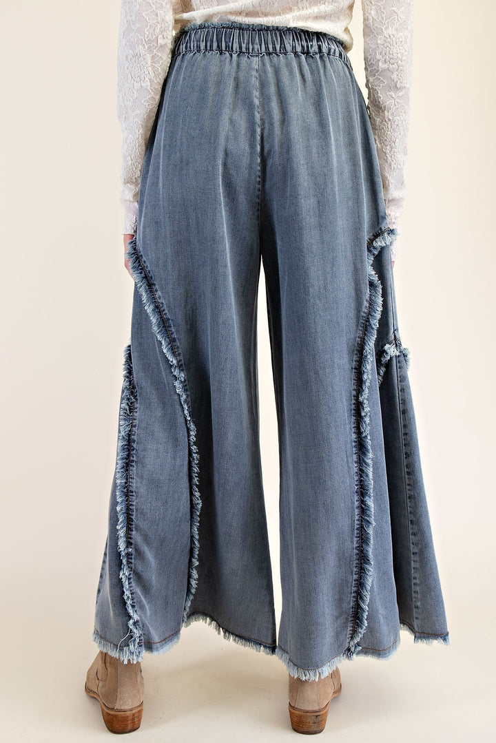 Easel Palazzo style wide leg washed blue denim pants with frayed fringe details