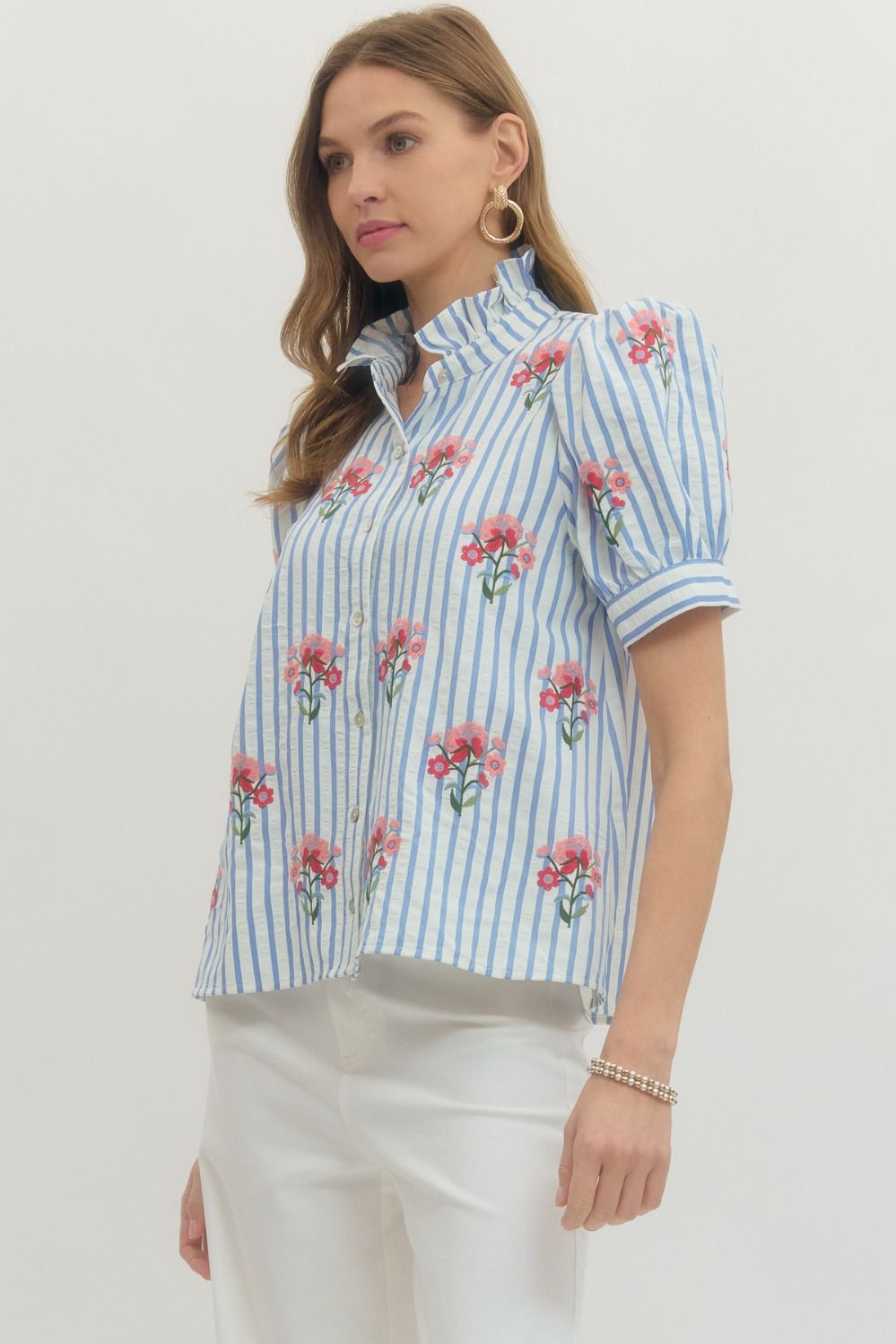 Entro blue and white striped button front top with pink and red embroidered flowers and a ruffled neck