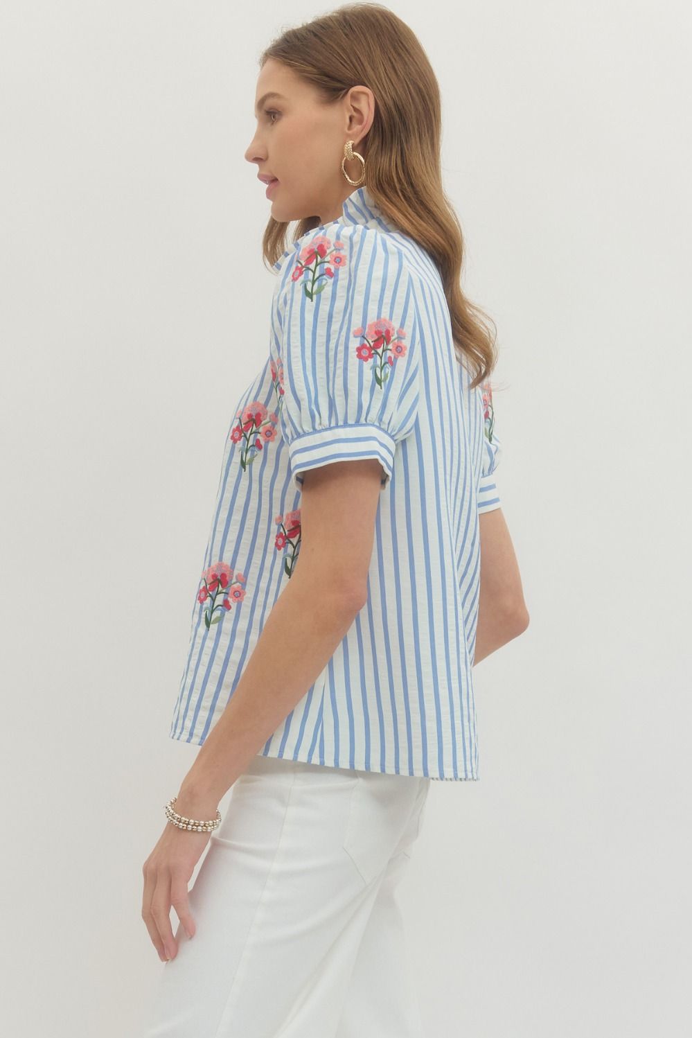 Entro blue and white striped button front top with pink and red embroidered flowers in a flattering silhouette