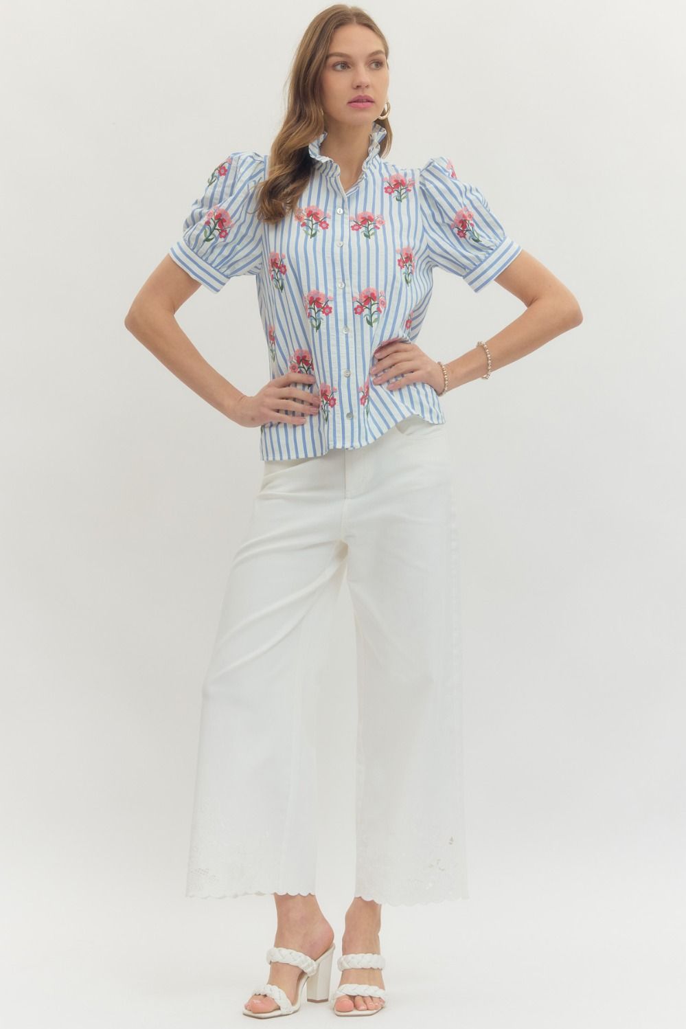 Entro blue and white striped button front top with pink and red flowers paired with white pants