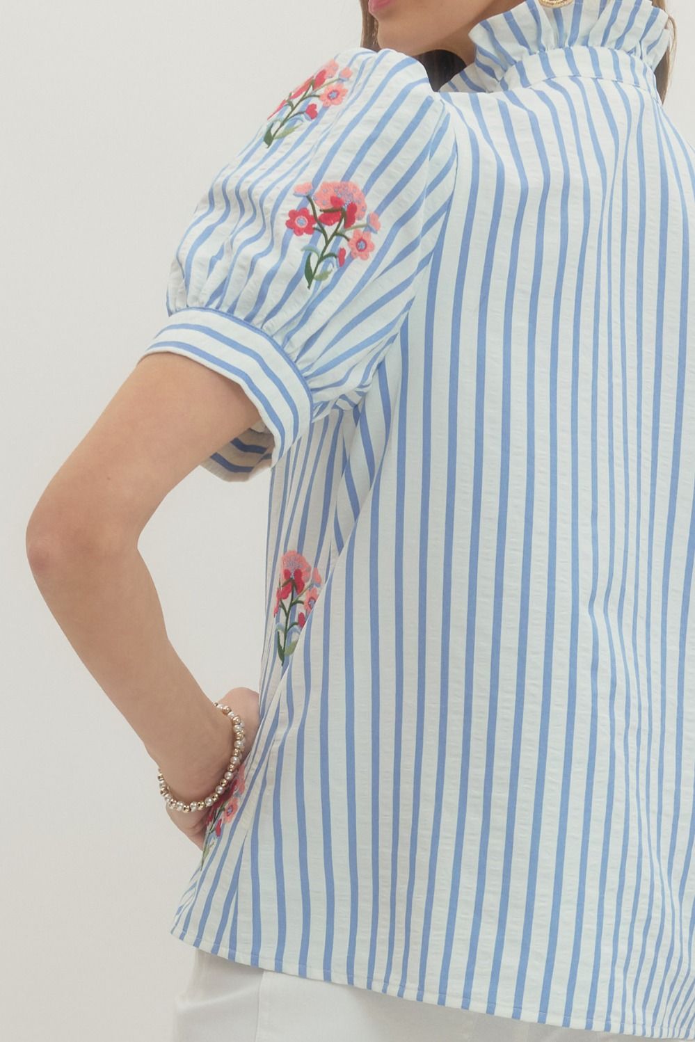 Entro blue and white striped button front top with pink and red embroidered flowers detailed on front