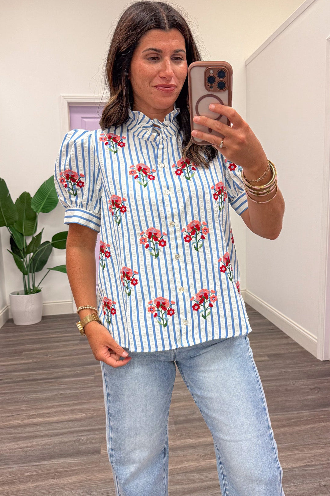 blue and white striped with red and pink embroidered flowers button front top