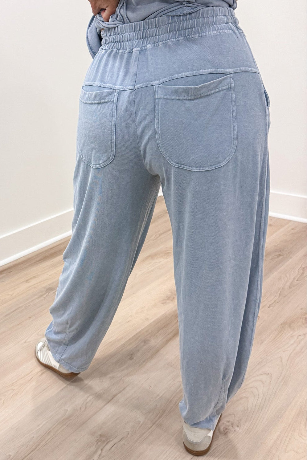 solid light blue elastic waist wide barrel leg lightweight knit pants with back pockets