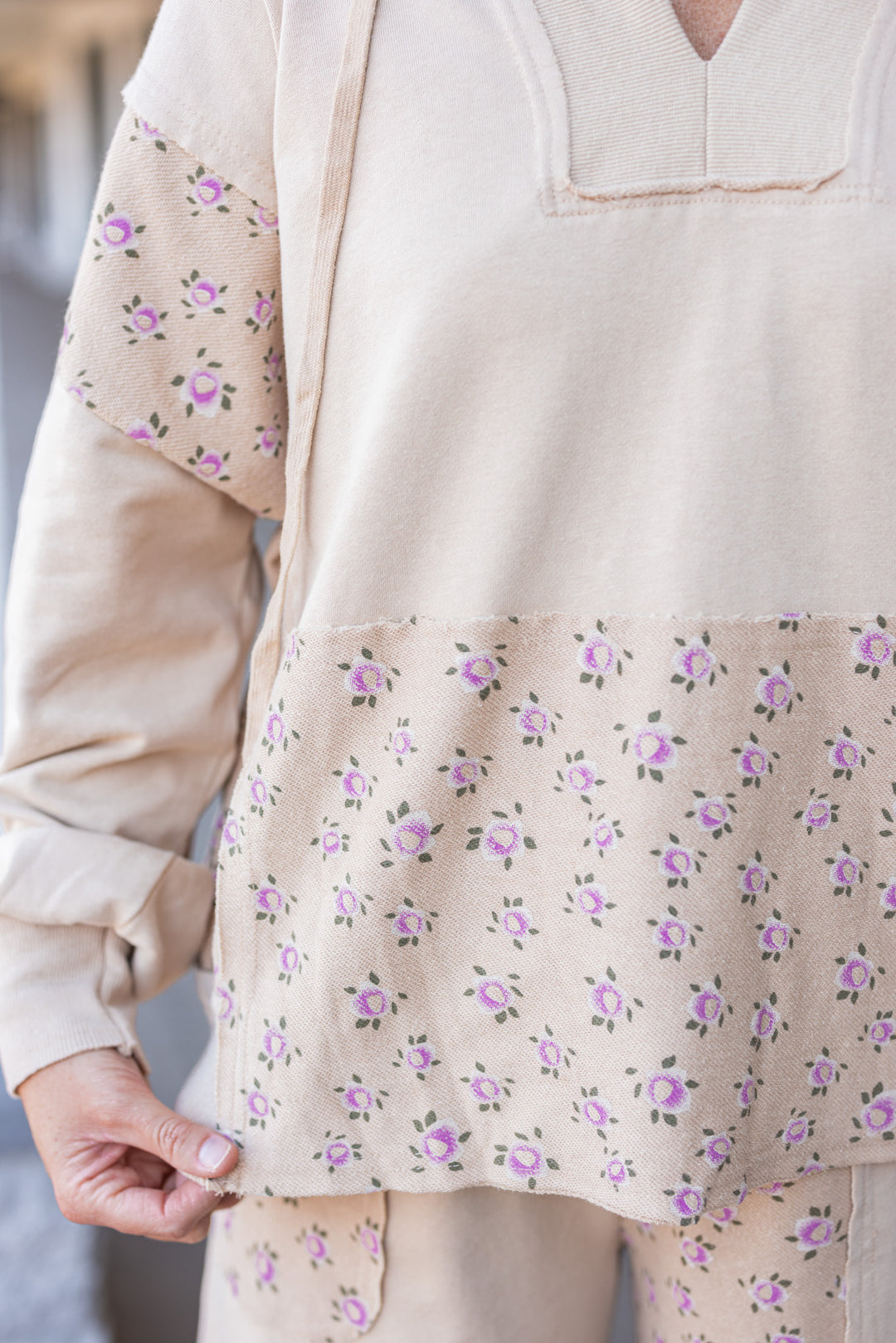 Women's washed khaki terry knit hooded pullover with pink floral print colorblock by Easel showing up close of floral pattern