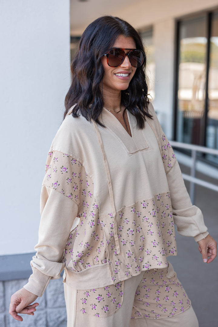 Women's washed khaki terry knit hooded pullover with pink floral print colorblock by Easel showing up close side view