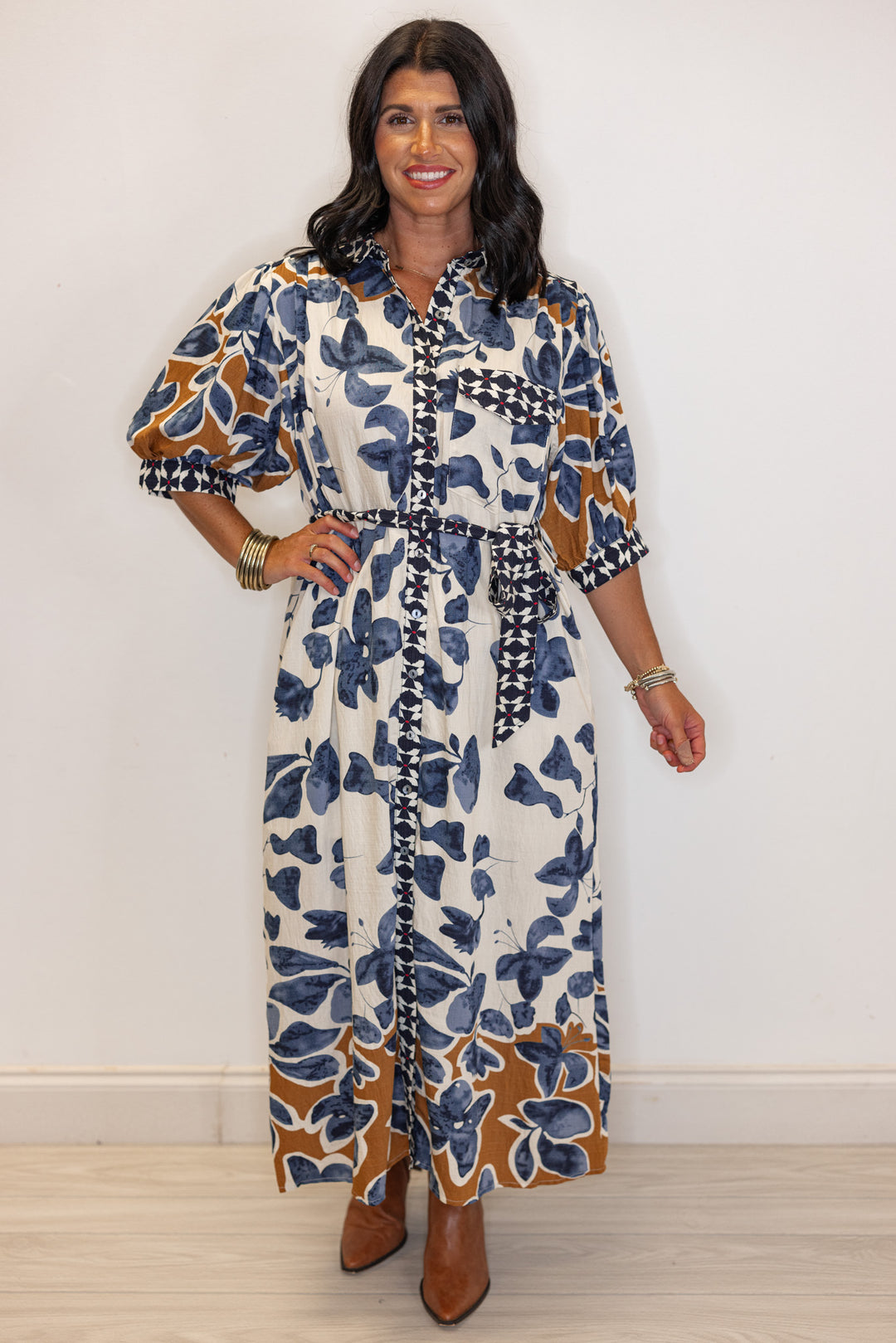 Women's cream, blue and caramel floral midi dress with navy and red floral trim by Entro showing full front view