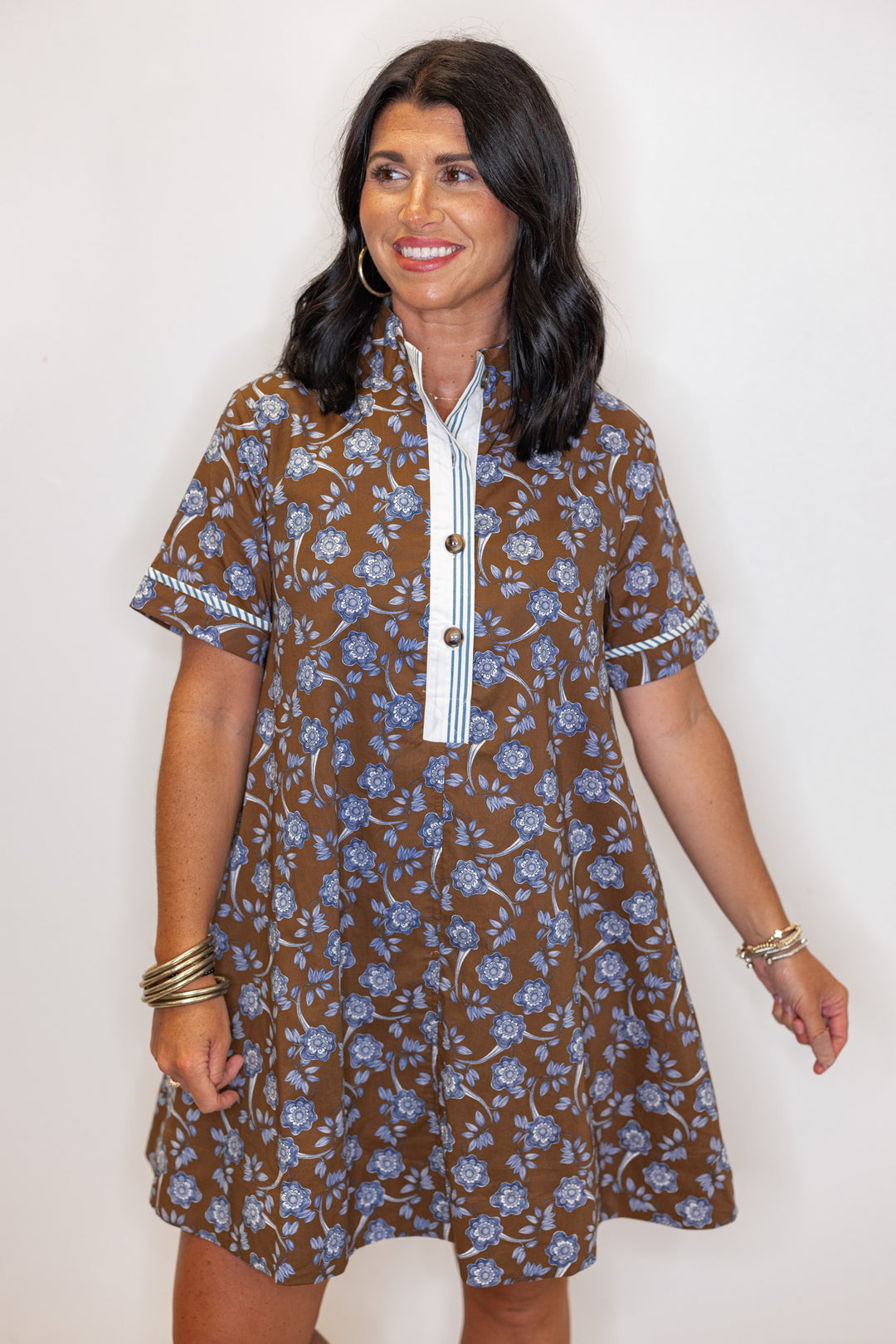 Women's brown dress with blue floral print and striped trim by Entro