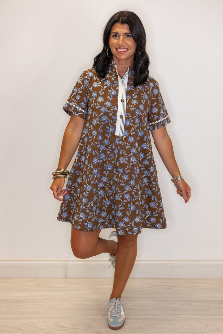 Women's brown dress with blue floral print and striped trim by Entro showing full front view