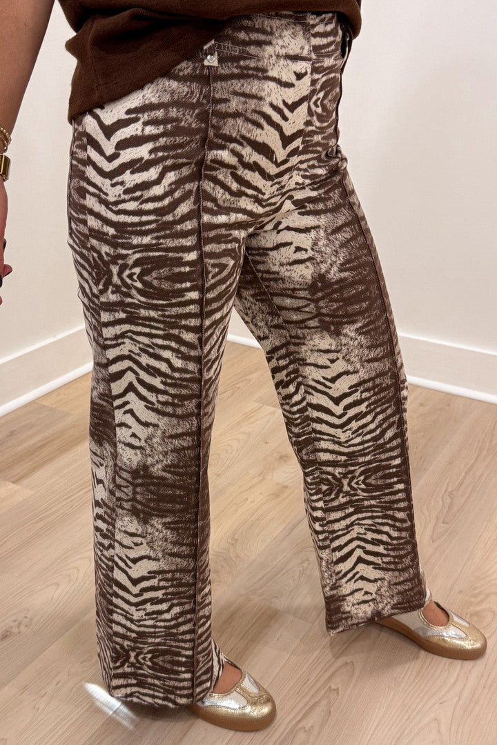 brown and cream zebra print wide leg lightweight twill denim pants with pintuck details