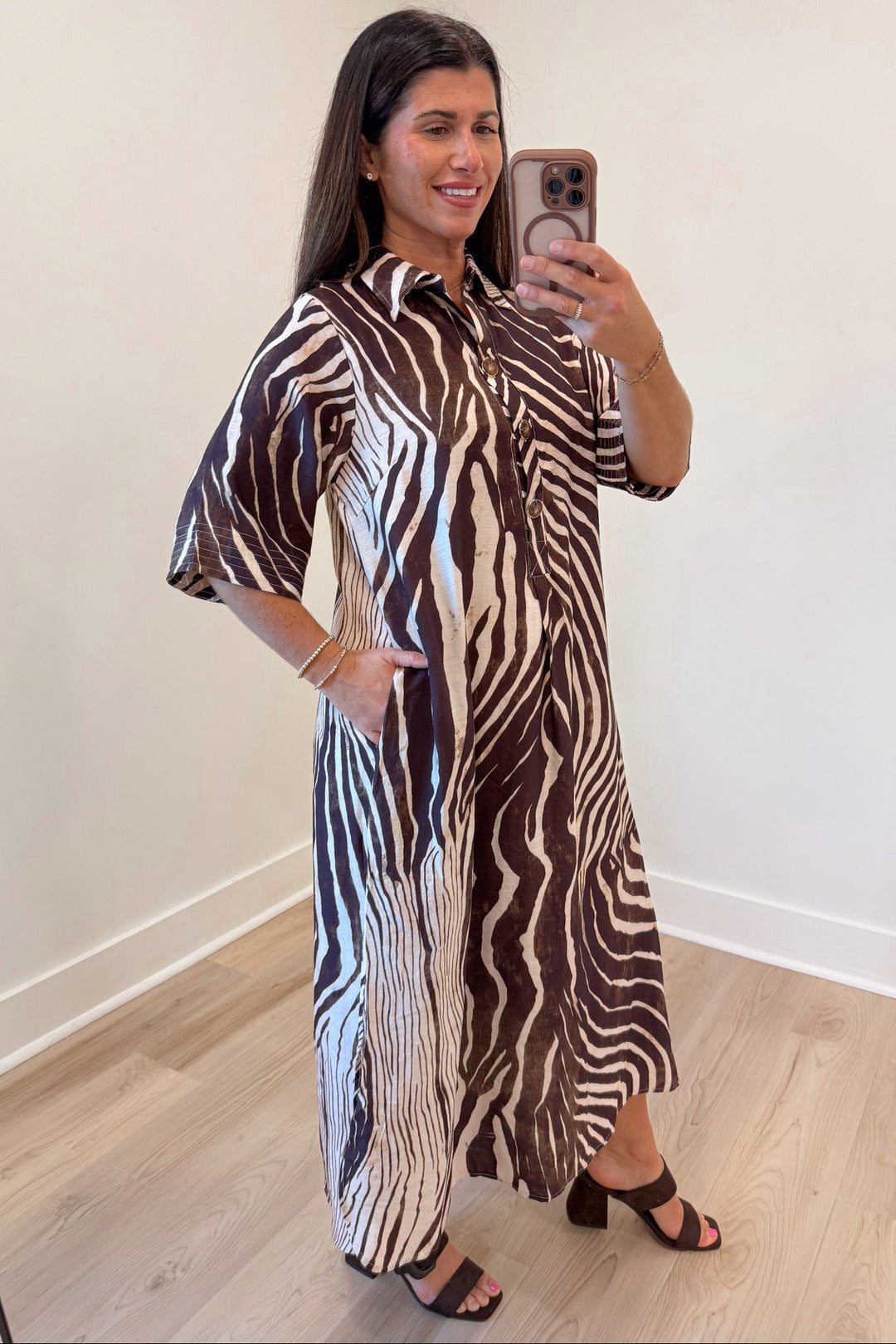 brown and ecru abstract zebra print half sleeve button front bodice midi dress with side pockets