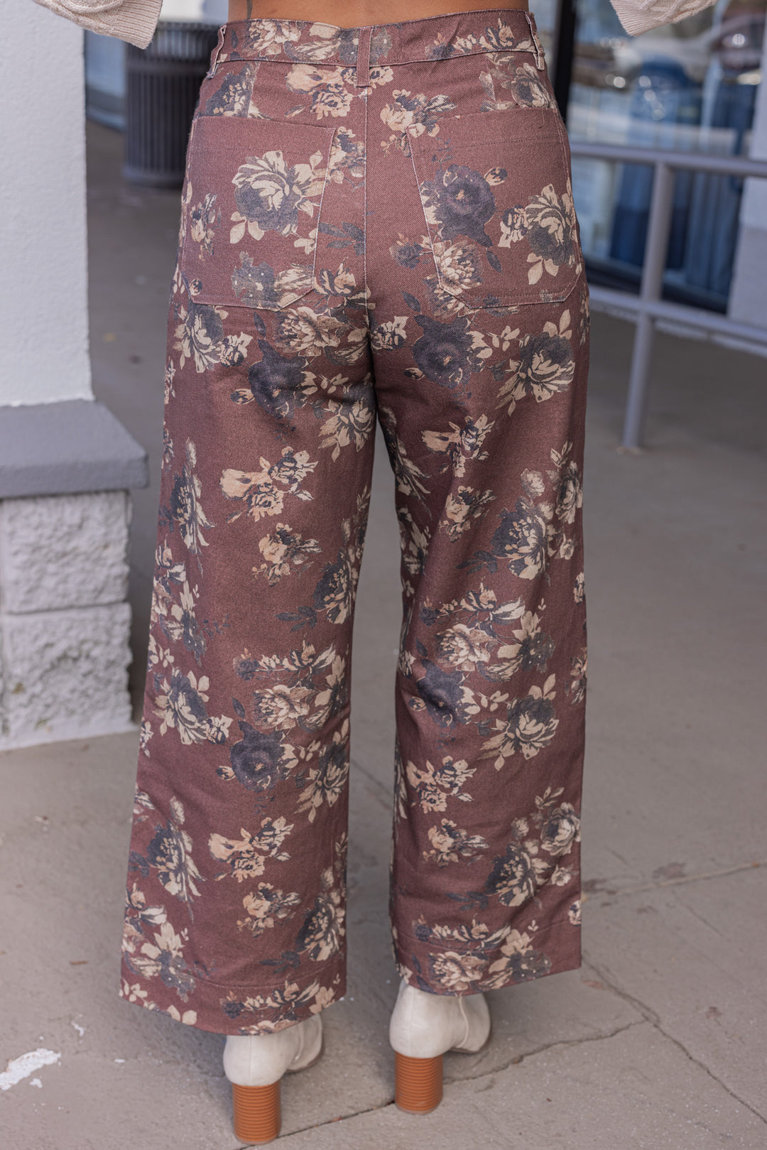 Women's brown twill floral print wide leg pants by Entro showing back view