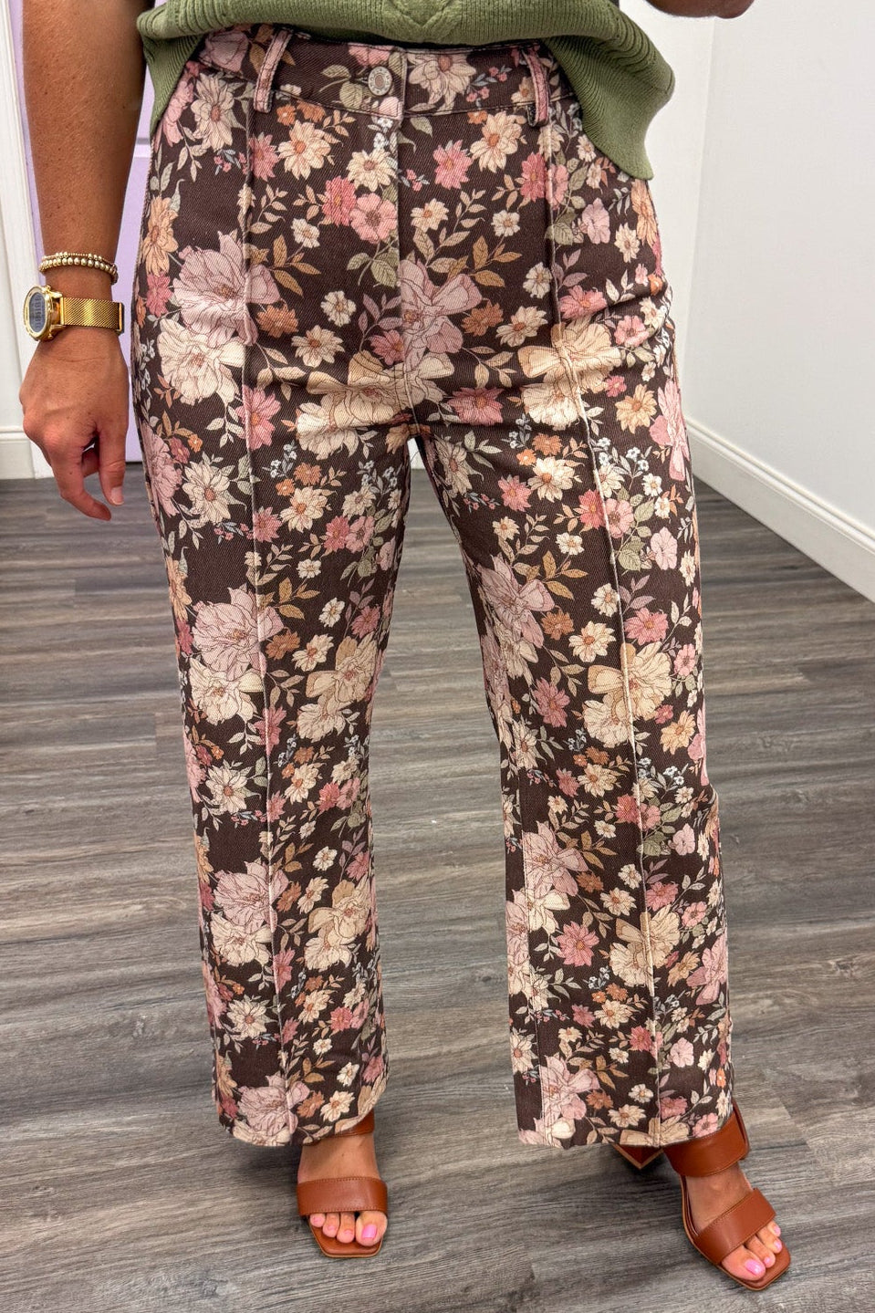 brown with multicolored floral print wide leg denim pants with pintuck details and button zipper closure