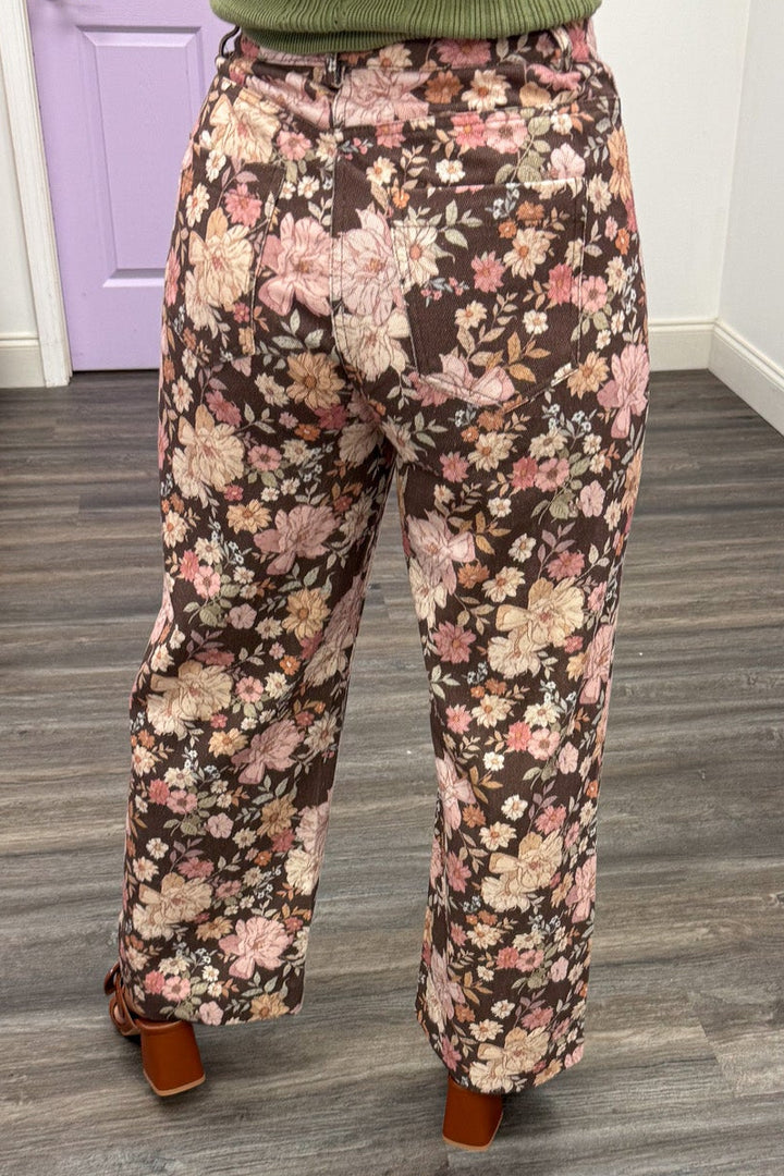 brown with multicolored floral print wide leg denim pants with pintuck details and back pockets
