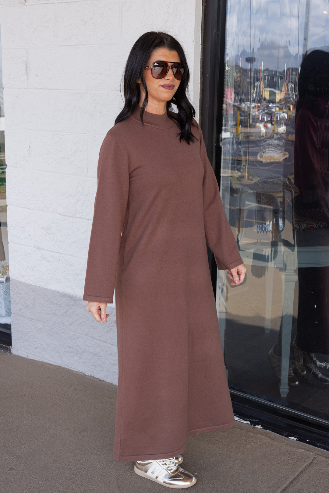 Women's coffee brown knit long sleeve midi sweater dress by Entro showing full slight side view