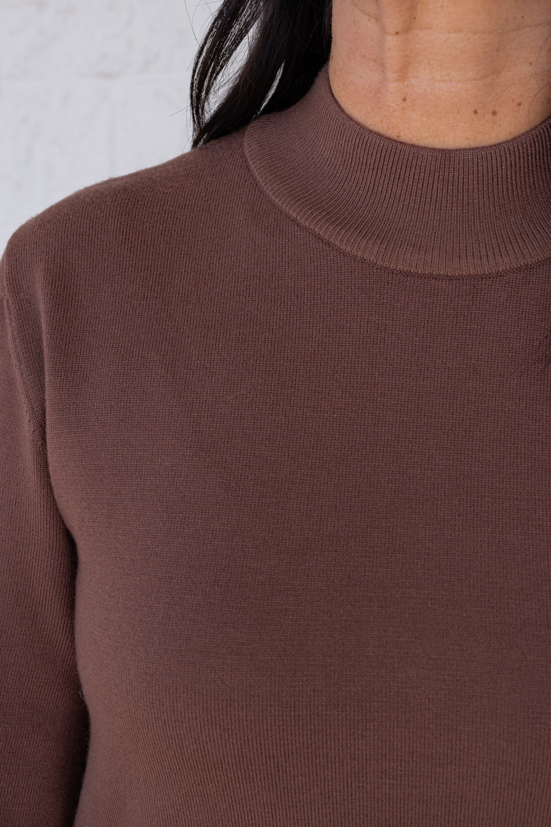 Women's coffee brown knit long sleeve midi sweater dress by Entro showing ribbed crew neckline